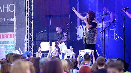 David preaching at a concert in Russia