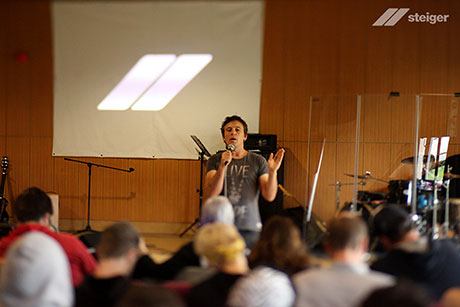 Luke Greenwood speaking at Revolutionary Week in Krögis, Germany